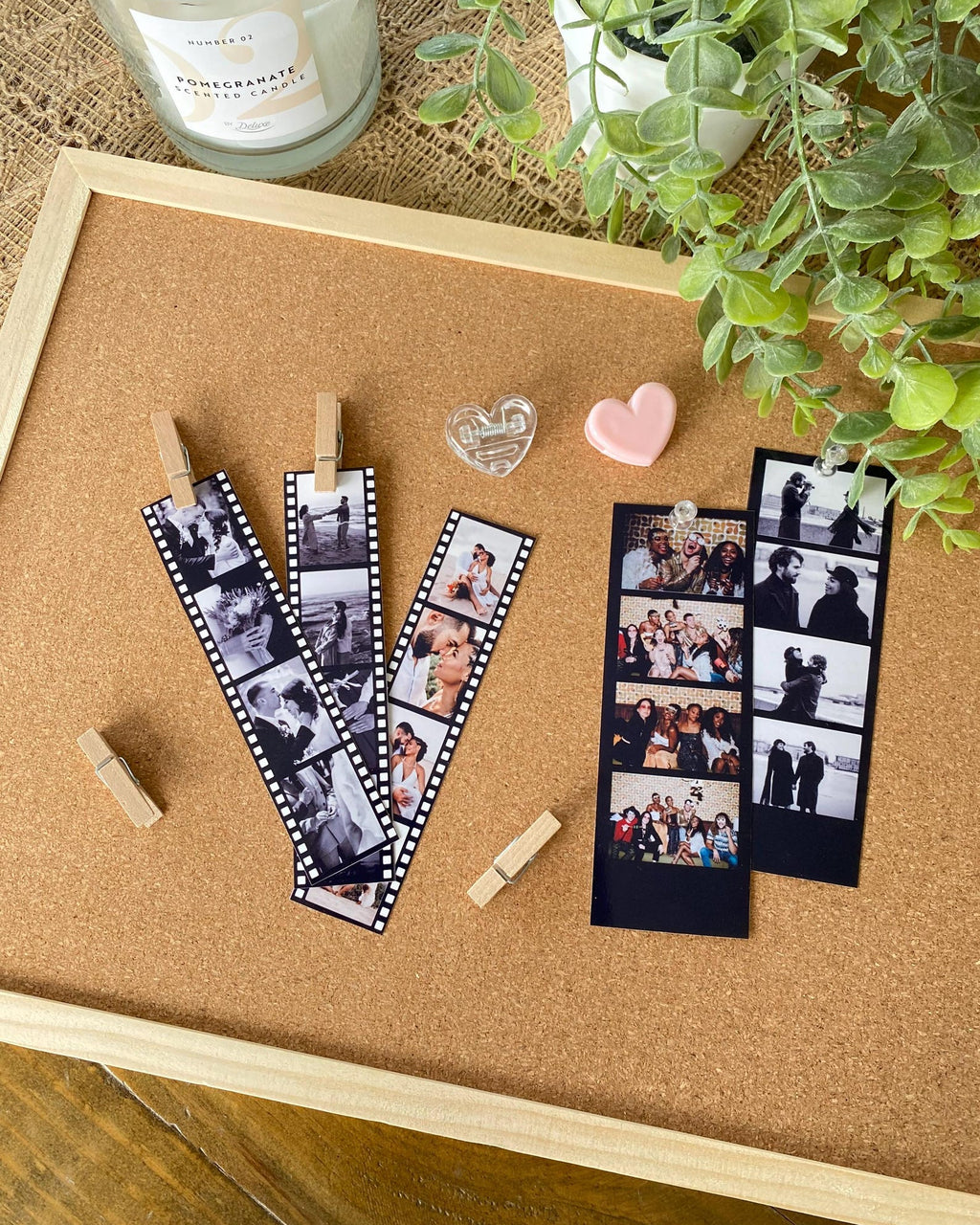 Film strip letters 'V' and 'W' on a cork board with photos and decorative items.