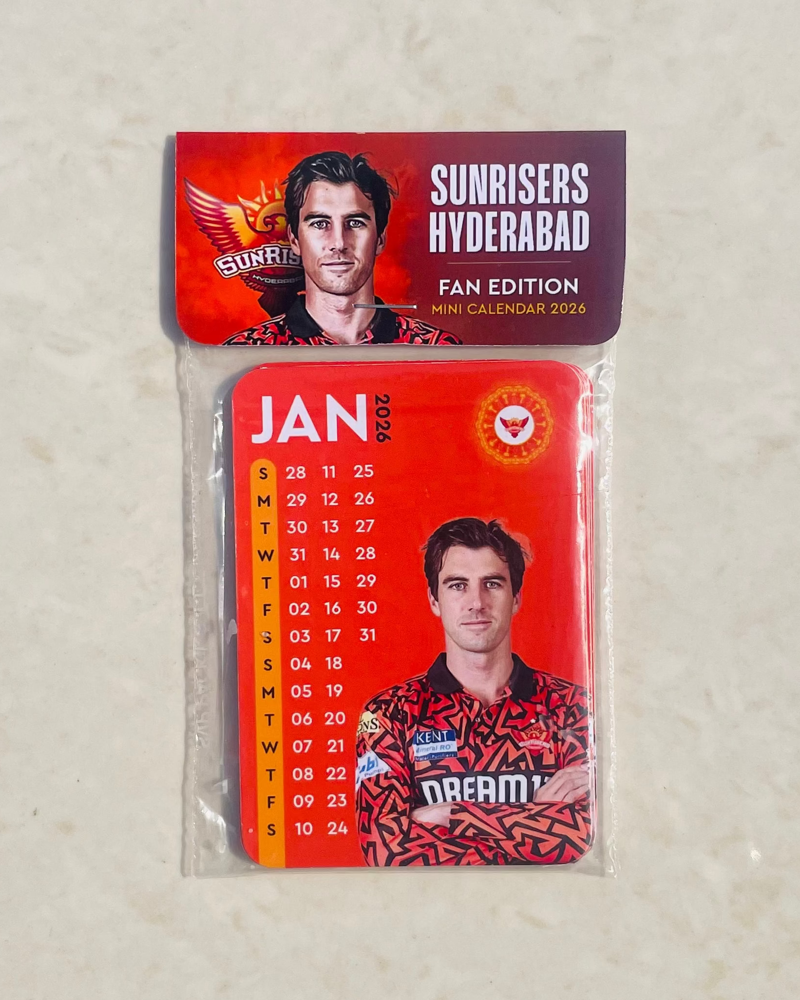 Calendar packaging with 'Sunrisers Hyderabad' branding on a textured beige background