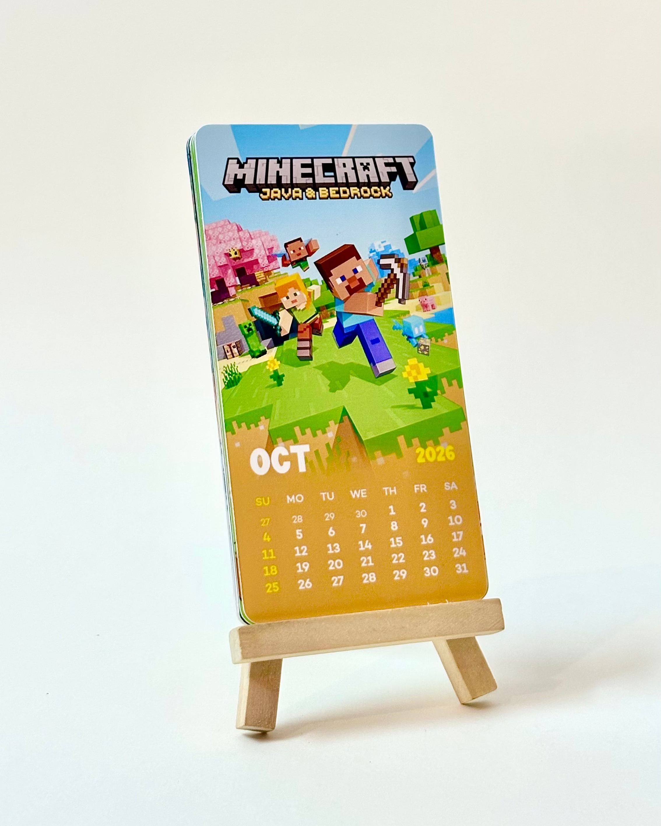 Calendar with Minecraft characters on a stand against a white background