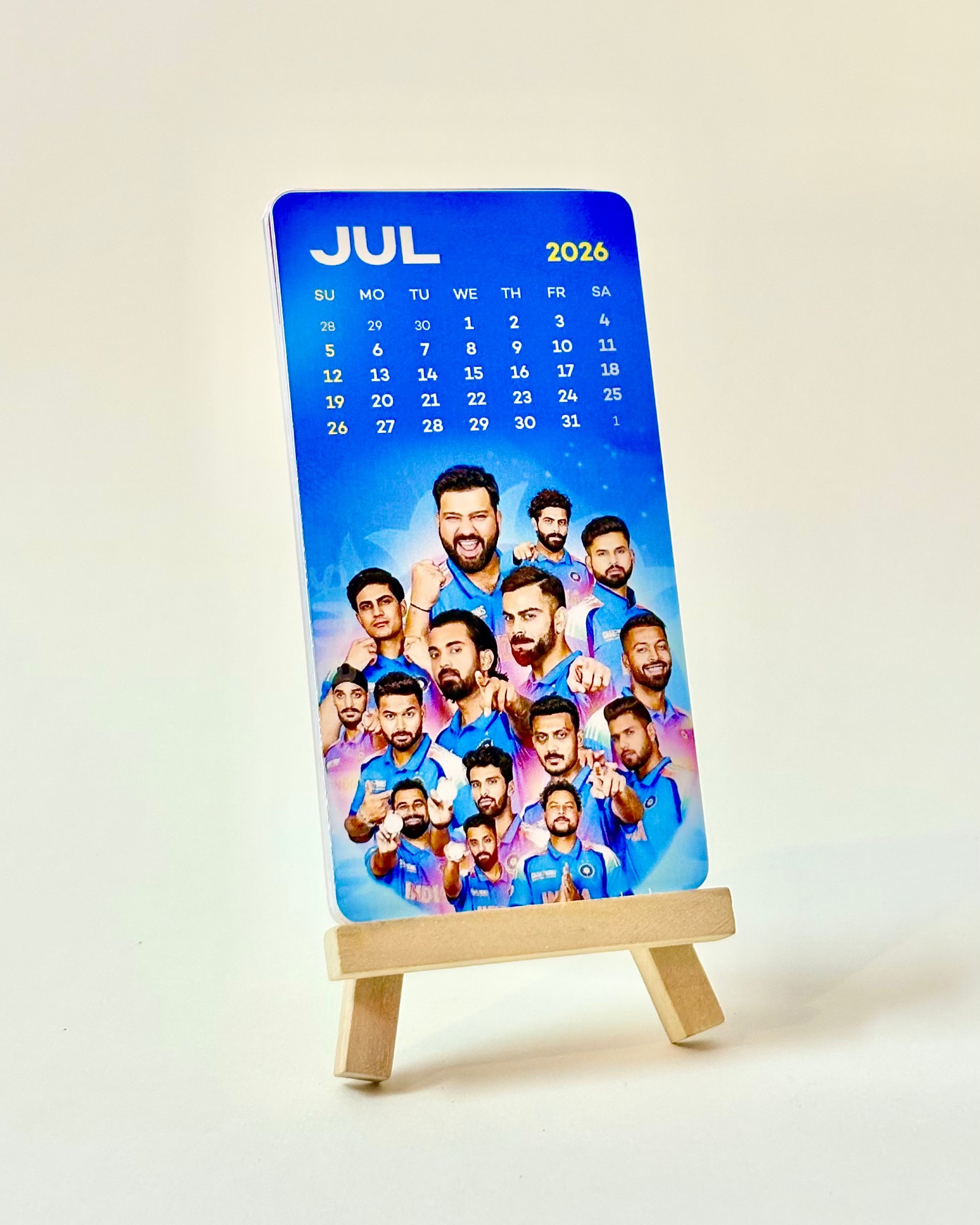 Calendar with a collage of people on a stand against a white background