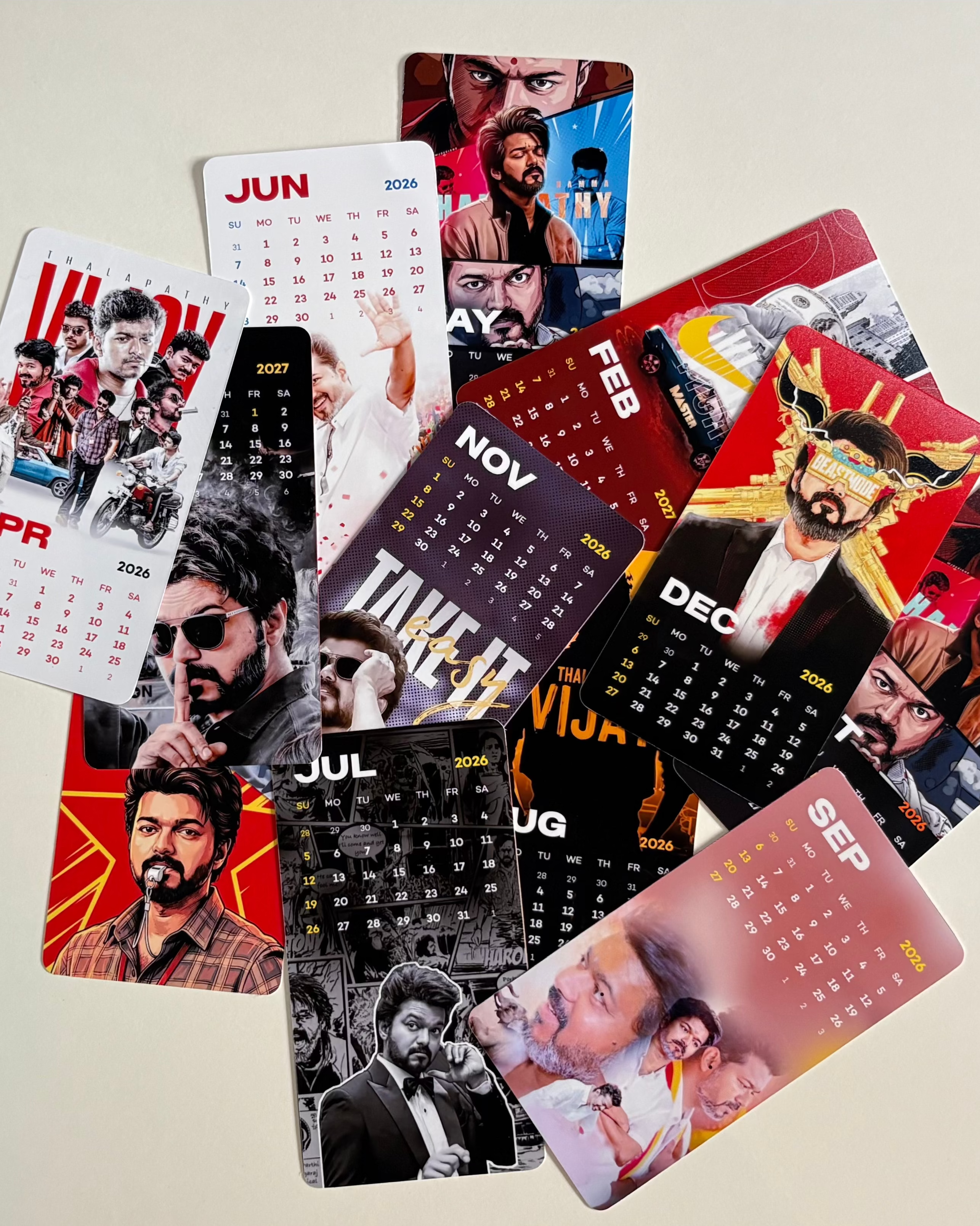 Collection of colorful trading cards on a light gray background