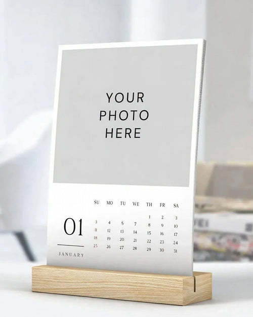 Calendar with wooden stand on a blurred background
